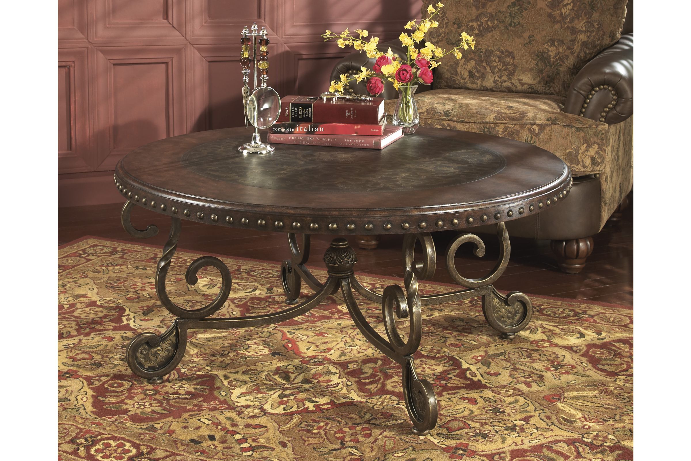 Rafferty Round Cocktail Table by Ashley at GardnerWhite